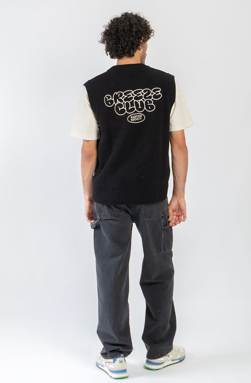 Chaleco unisex de punto negro con gráficos jacquard Breeze Club en blanco.