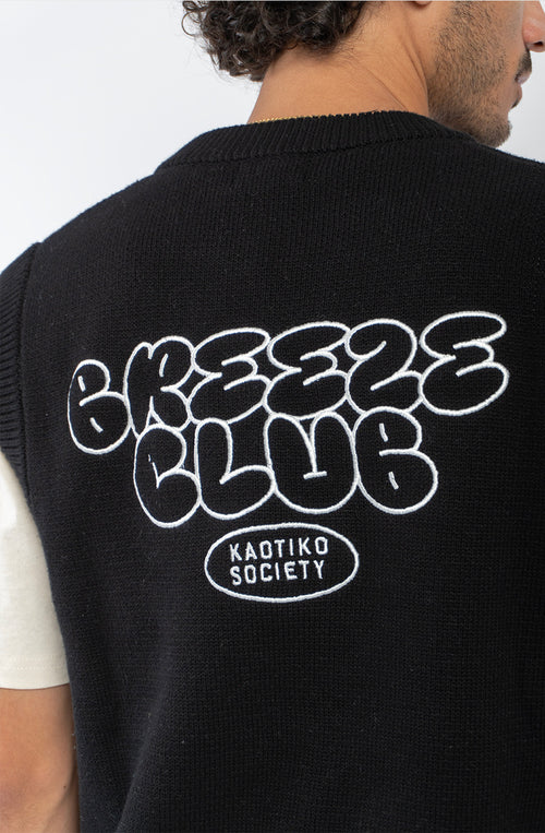 Chaleco unisex de punto negro con gráficos jacquard Breeze Club en blanco.