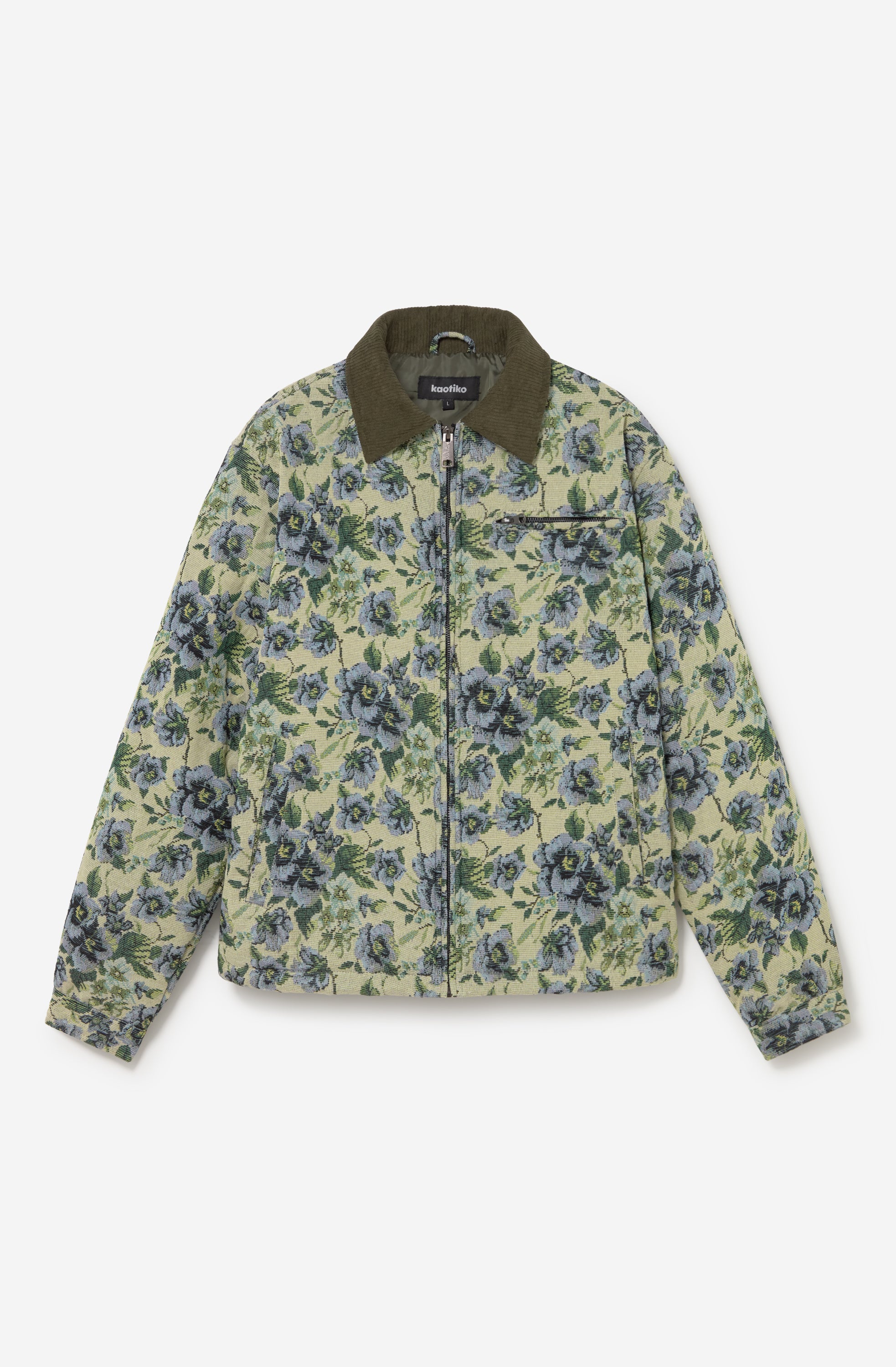 Chaqueta unisex de tejido tapestry con estampado floral en tonos verde, azul y crema, cuello de pana en contraste, cierre de cremallera y bolsillo de pecho con cremallera.