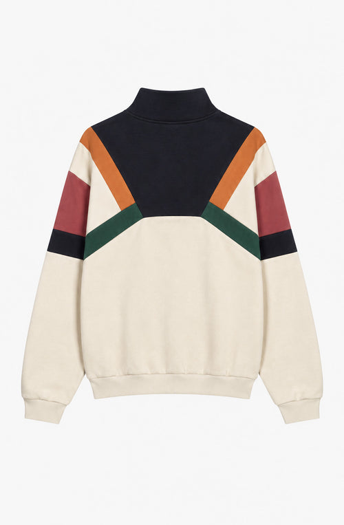 Sudadera unisex Aleck en color crudo con paneles geométricos azul marino, naranja, verde y rosa, cuello alto con media cremallera y logo Kaotiko en el pecho.
